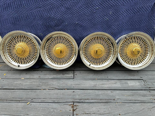 Triple Gold Daytons 16x7 standard 100 spoke wire wheels